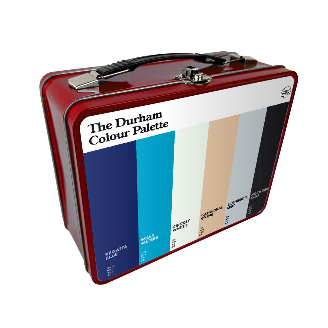 Durham Colour Palette metal lunch box featuring six colour swatches inspired by Durham Regatta, the River Wear, Chester-le-Street cricket and Durham Cathedral.