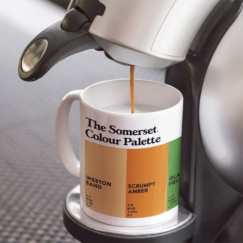 Somerset Colour Palette porcelain mug with six colour swatches celebrating Weston-super-Mare, Somerset cider, Glastonbury, Bath and Exmoor.