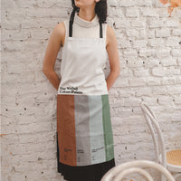 Walsall Colour Palette apron decorated with six colours inspired by the town’s saddlery heritage, famous landmarks and notable local people.