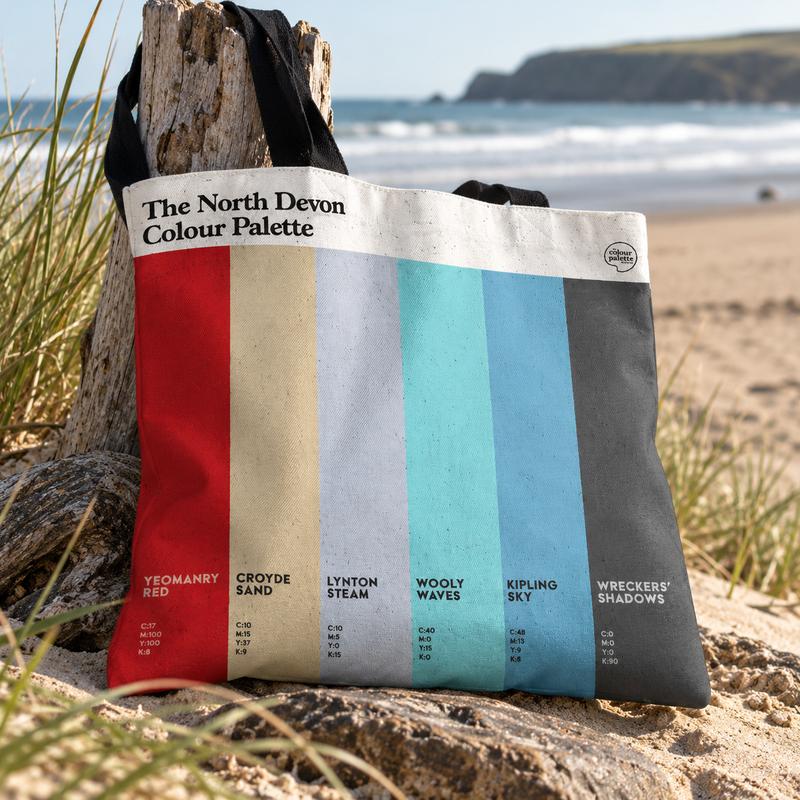 North Devon Colour Palette cotton tote shopper bag with black handles and six vertical colour swatches inspired by the Devon coast and local landmarks.
