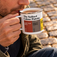 Salford Colour Palette enamel mug with a cup of tea