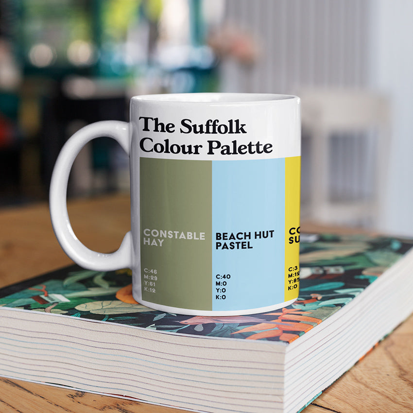Suffolk Colour Palette porcelain mug with six colour swatches celebrating the Suffolk coast, Sutton Hoo, John Constable and local heritage.