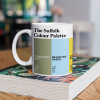 Suffolk Colour Palette porcelain mug with six colour swatches celebrating the Suffolk coast, Sutton Hoo, John Constable and local heritage.